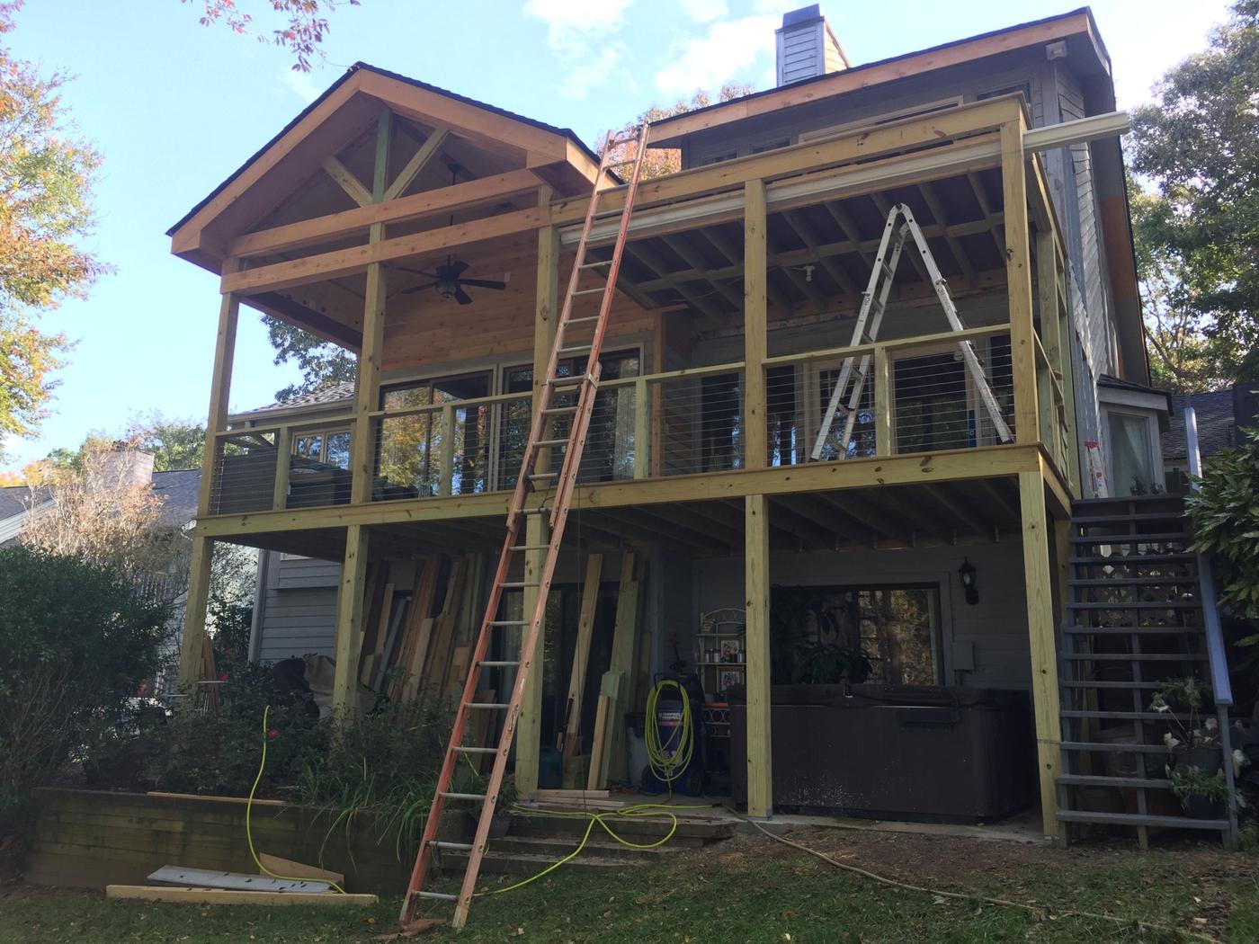 Cable railing being installed